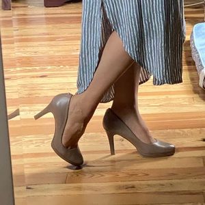 Tahari tan pumps